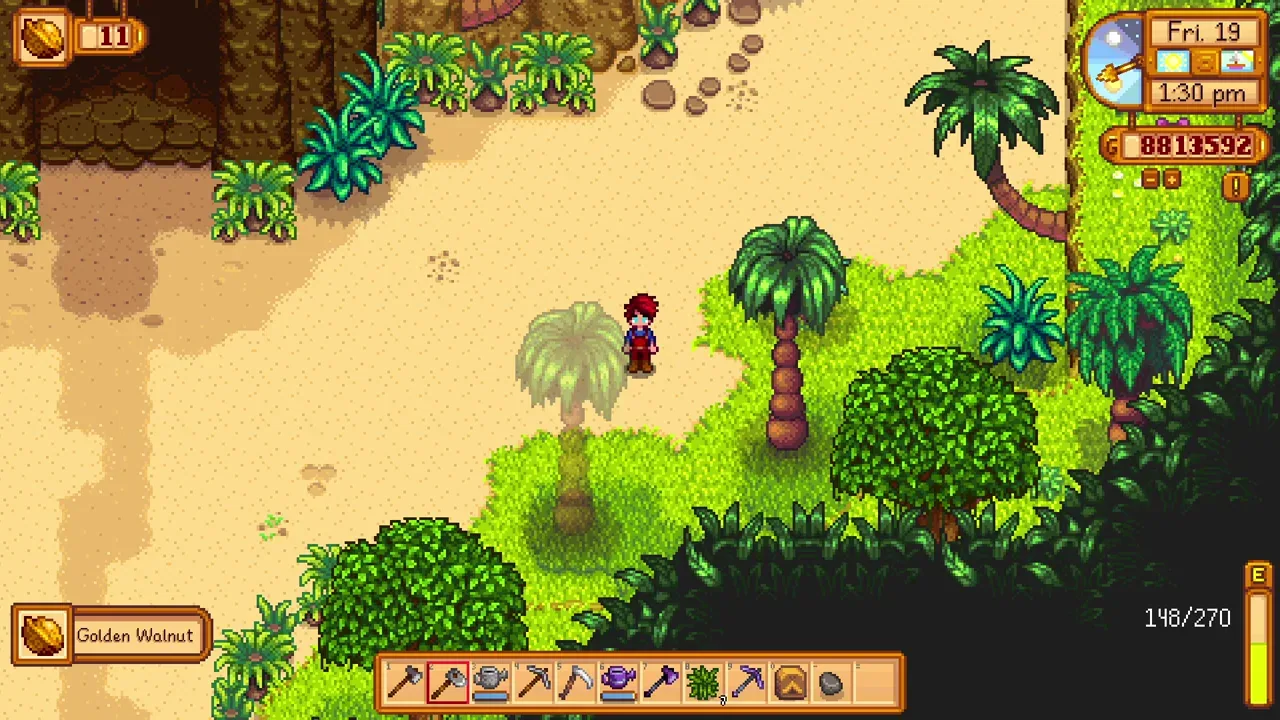 A Golden Walnut in the high curved tree beside the volcano in Stardew Valley