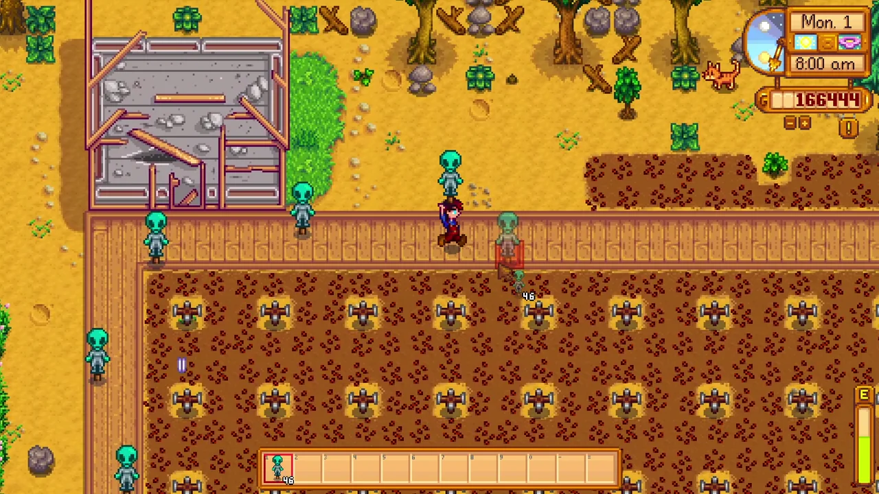 Stardew Valley: Alien Rarecrows around a crop field