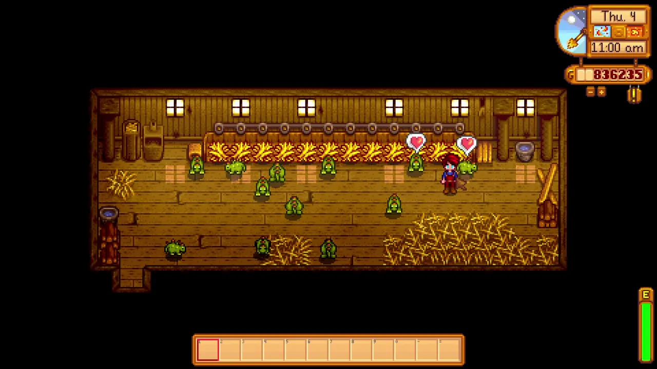 Stardew Valley: Animals and the feeding bench inside a barn